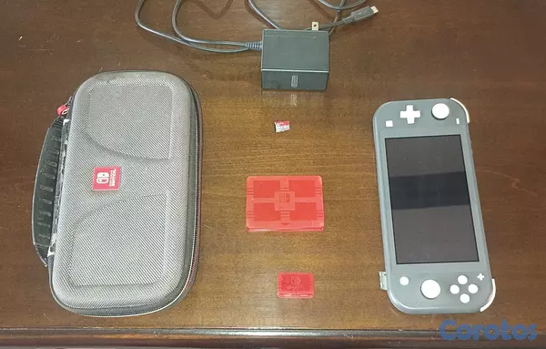 consolas y videojuegos - Nintendo Switch Lite (Modchip Hackeado) + Cargador 6