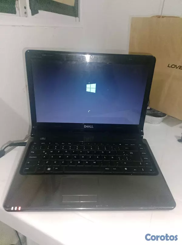 computadoras y laptops - DELL INSPIRON 1464 Negociable con algunos Defectos 4