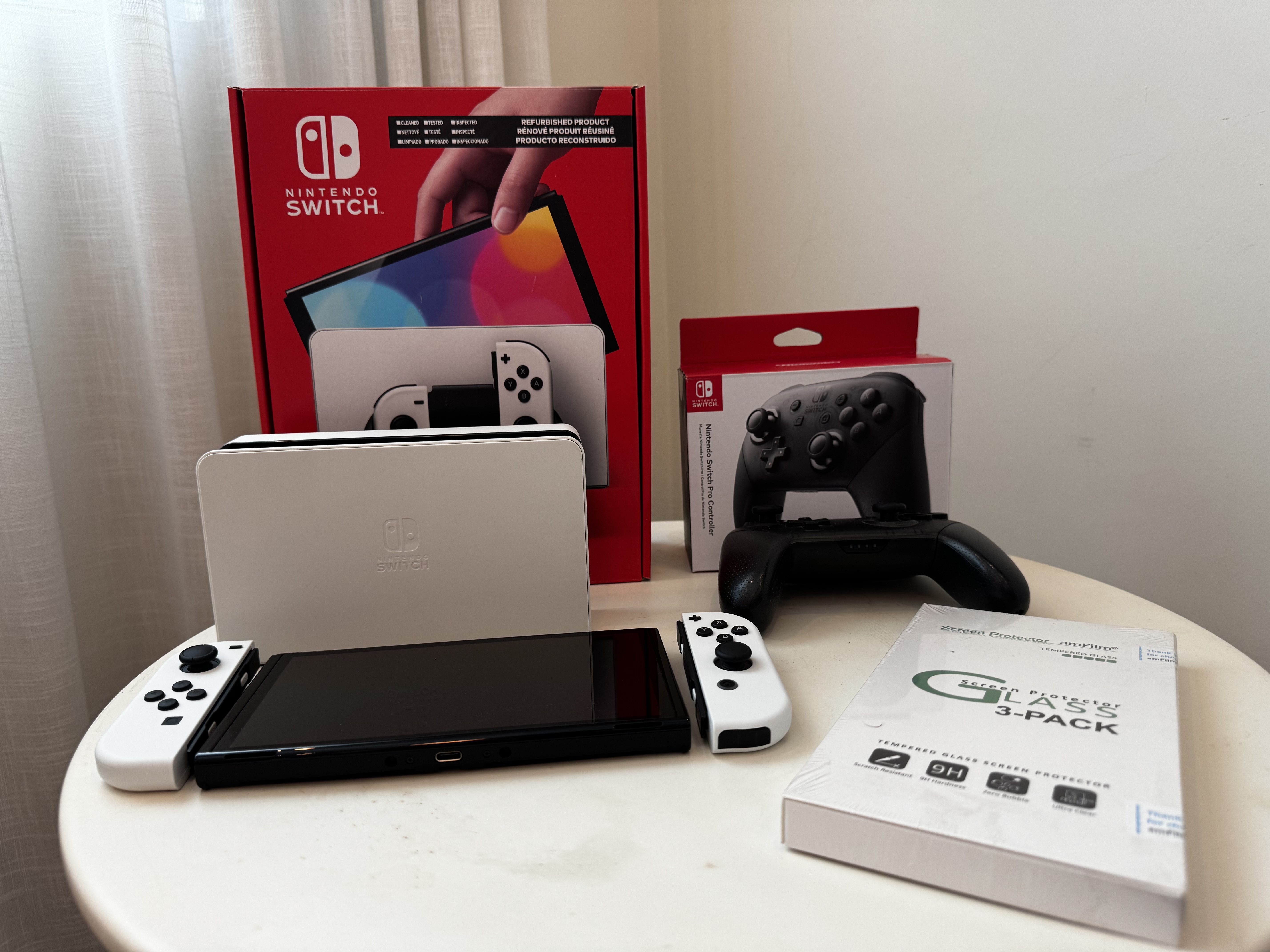 consolas y videojuegos - Nintendo Switch OLED + ProController + 4 Juegos 0