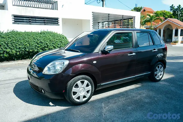 carros - VENDO MAZDA VERISA 2010 13