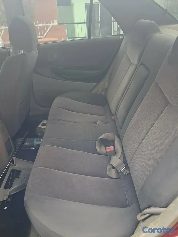 carros - Se vende Mazda 323 año 2002 2