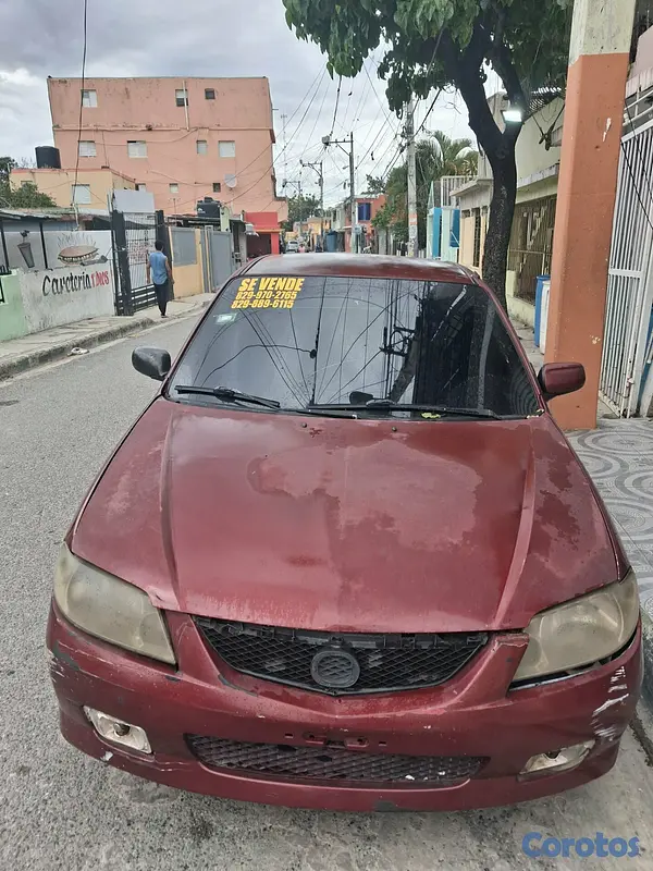 carros - Se vende Mazda 323 año 2002 5
