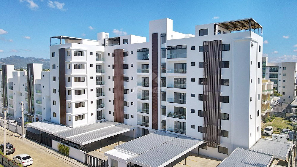 apartamentos - PRIMER NIVEL CON ROOFTOP Y PARQUEOS TECHADOS JARDINES DEL ESTE STGO. 