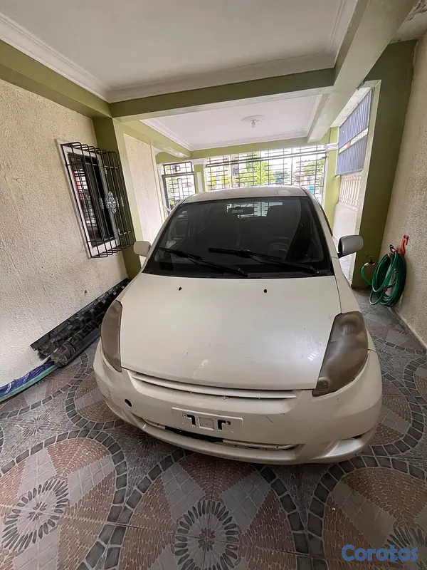 carros - Toyota Passo color blanco 2009 2