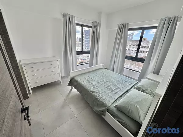 apartamentos - alquiló amueblado naco piso 11 dos habitaciones con baño balcón dos parqueos  7