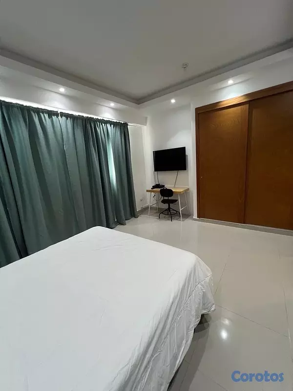apartamentos - vendo amueblado piso 10 serralles una habitación parqueo baño área lavado  4