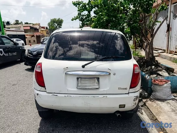 carros - Toyota Duet 2002 7