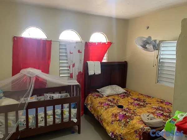 casas - SE VENDE CASA EN ANDRES, BOCA CHICA, A 1 ESQ. DE L 6