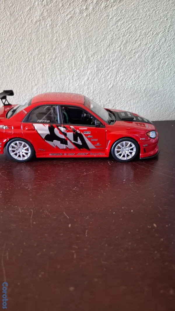 hobby y coleccion - Subaru Impreza wrx sti, escala 1.24  9