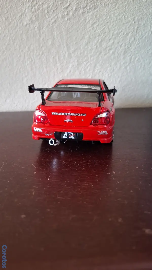 hobby y coleccion - Subaru Impreza wrx sti, escala 1.24  10