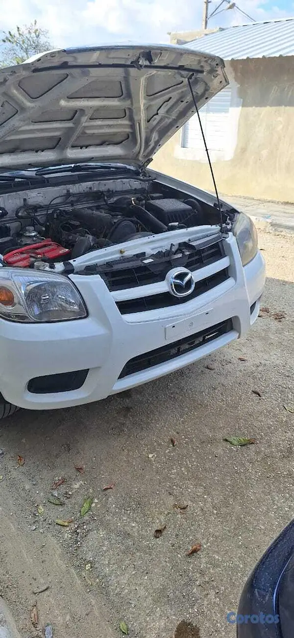 jeepetas y camionetas - camioneta Mazda la full 2014 poco uso  8