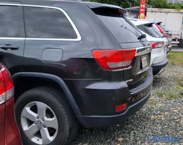 jeepetas y camionetas - JEEP GRAND CHEROKEE LAREDO 2011 9
