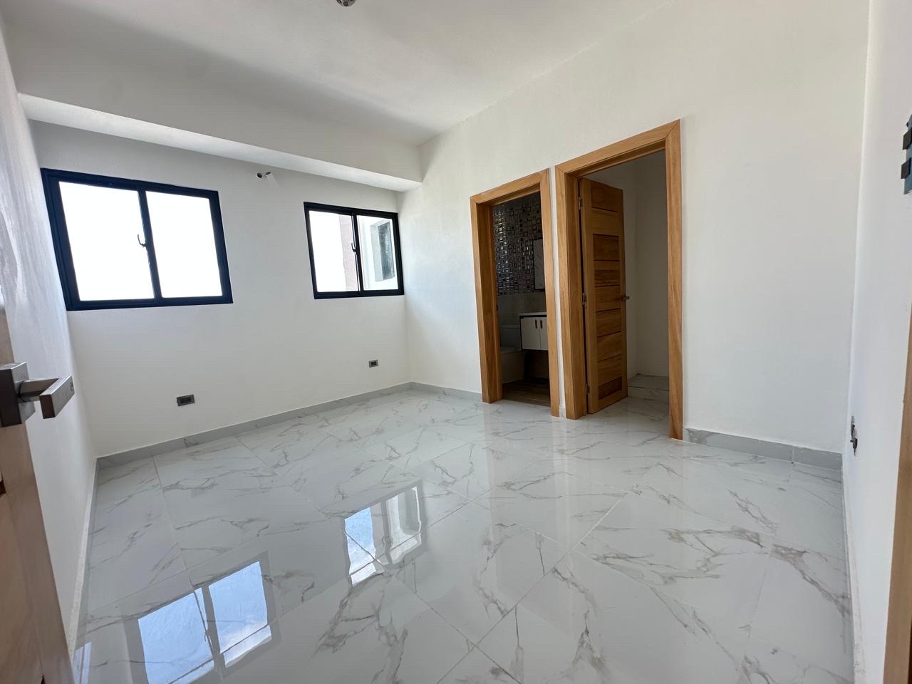 apartamentos - hermoso apartamento en una zona céntrica y tranquila en el millón  5