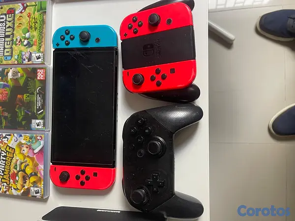 consolas y videojuegos - Nintendo Switch Oled blanco con 9 juegos 2