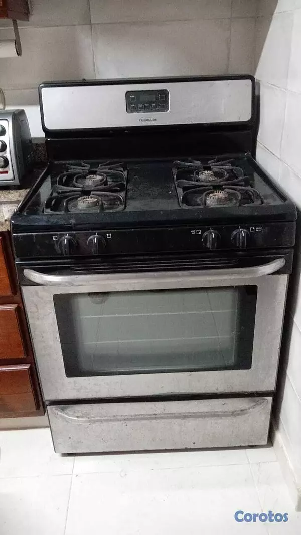 cocina - Estufa de 4 hornillas marca Frigidaire en venta
